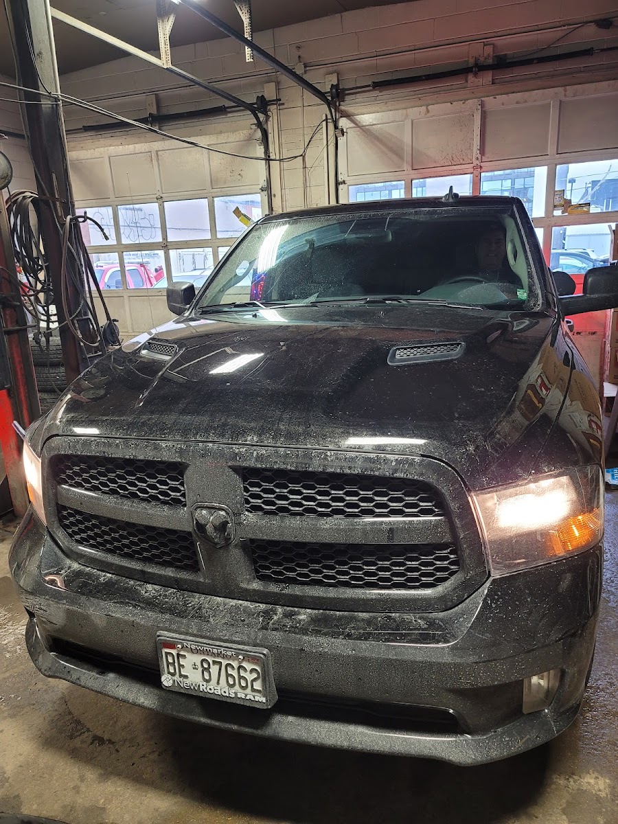 Pickup truck pulled into the service bay